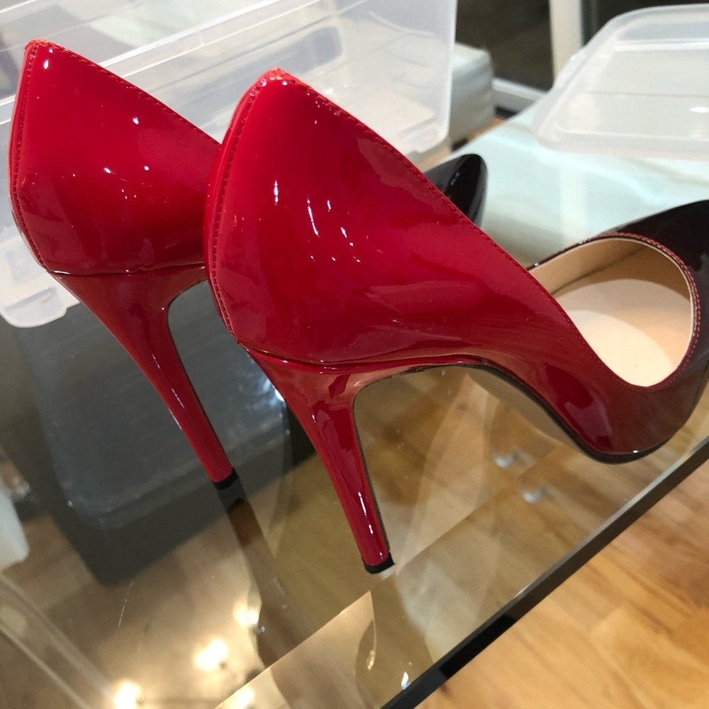 Black/Red  patent leather  high  heels ; worn only once , spotless , 5”heels